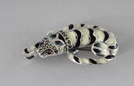 A SILVER RUBY EYE DECO DESIGN PANTHER BROOCH.