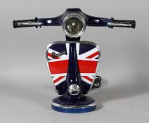 A BLUE VESPA LAMP. 13ins high.