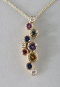AN 18CT GOLD MULTI SAPPHIRE PENDANT on chain.
