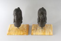 MAURICE FRECOURT A PAIR OF EGYPTIAN REVIVAL BUSTS on sienna marble bases.