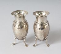 A PAIR OF VICTORIAN SILVER VASES, in a fitted case. London 1900.