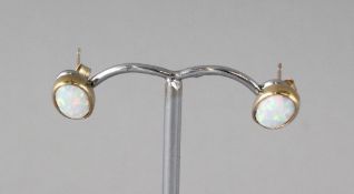 A PAIR OF 9CT GOLD OPAL STUD EARRINGS.