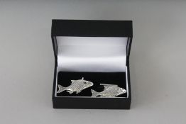 A PAIR OF SILVER FISH CUFFLINKS.