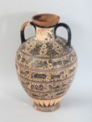 AFTER THE ANTIQUE A TWO-HANDLED EASTERN POTTERY VASE. 13.5ins high.