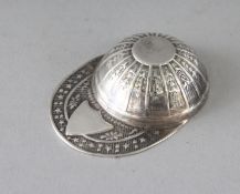 A SILVER JOCKEY CAP CADDY SPOON.