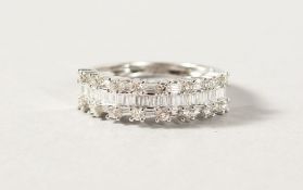 A VERY GOOD 18K WHITE GOLD BAGUETTE BAND RING.