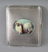 AN ENGINE TURNED SILVER CIGARETTE CASE, Chester 1904, with an oval of a Pekingese dog.
