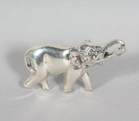 A SILVER ELEPHANT BROOCH.
