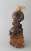 A CARVED WOOD FIGURE. 7ins high.