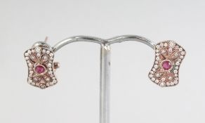 A PAIR OF 18CT YELLOW GOLD, DIAMOND AND RUBY VINTAGE EARRINGS, set with eighteen rose diamonds.