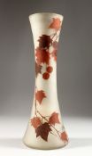 A FRENCH OPAQUE GLASS VASE, with waisted sides, painted in autumnal colours with leaves and berries,