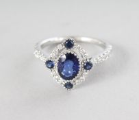 AN 18CT WHITE GOLD, SAPPHIRE (1.29cts) AND DIAMOND (0.40cts) VINTAGE STYLE RING.
