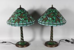 A GOOD PAIR OF TIFFANY DESIGN GREEN DRAGONFLY LAMPS. 22ins high.