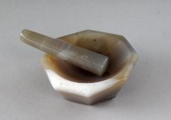 AN OCTAGONAL AGATE PESTLE AND MORTAR. 2.5ins.