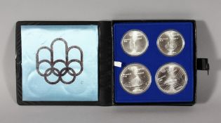 THE OLYMPIC (1976) SET OF FOUR SILVER COINS, Montreal, 5 dollars (2) and 10 dollars (2).