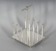 A PLAIN CHRISTOPHER DRESSER DESIGN TOAST RACK.