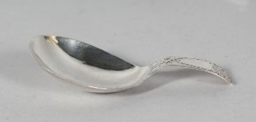 A GEORGE III BRIGHT CUT CADDY SPOON. London 1801.