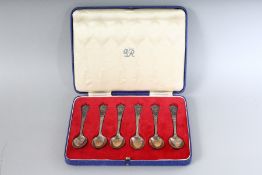 A SET OF SIX GEORGE VI SPOONS in a fitted case.