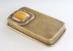 A BRASS RECTANGULAR SNUFF BOX with inset hardstone top. 3.25ins.