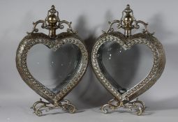 A PAIR OF PIERCED HEART SHAPED LANTERNS. 21ins high.