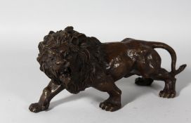 AFTER BARYE A BRONZE LION. 13ins long.