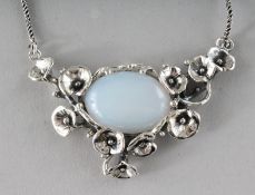 AN ART NOUVEAU DESIGN SILVER AND MOONSTONE NECKLACE.