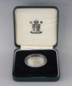 A 1995 UNITED KINGDOM SECOND WORLD WAR SILVER PROOF TWO POUND COIN.