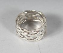 A SILVER KNOT RING.