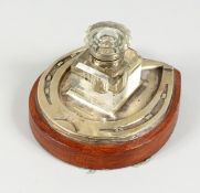 A SILVER PLATED HORSESHOE SHAPE INKSTAND, with cut glass ink bottle. 6ins wide.