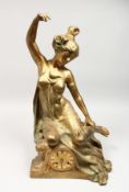 AN ART NOUVEAU GILT SPELTER FIGURAL MANTLE CLOCK, with eight-day movement, the case modelled as a