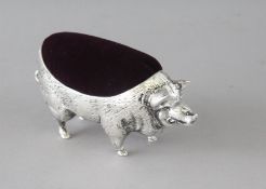 AN 800 PIG PIN CUSHION. 4ins long.