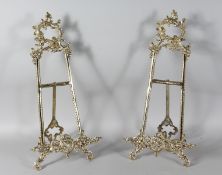 A GOOD LARGE PAIR OF BRASS EASELS. 20ins high.