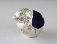 A SILVER CHICK PIN CUSHION. 2ins