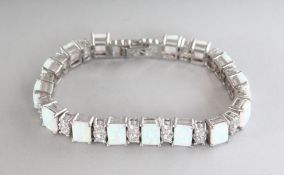 A GOOD SILVER, GILSON OPAL AND CZ LINE BRACELET.