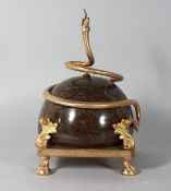 A MARBLE AND GILT BRONZE CENTREPIECE ENTWINED WITH A SNAKE on claw and ball feet. 13ins high.