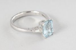 AN 18CT WHITE GOLD SINGLE STONE OCTAGON AQUAMARINE (1.21cts), with diamond (0.08cts) tapered