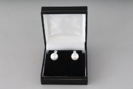 A GOOD PAIR OF PEARL AND DIAMOND DROP EARRINGS.