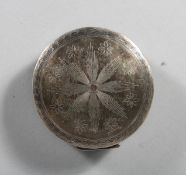A 19TH CENTURY DUTCH SILVER CIRCULAR SNUFF BOX with engraved star top. 2.25ins diameter.