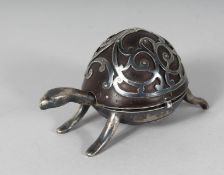 A RARE SILVER MOUNTED TORTOISESHELL 