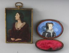 A THREE-QUARTER LENGTH PORTRAIT MINIATURE OF A LADY, signed, 4ins x 3ins, and another oval miniature