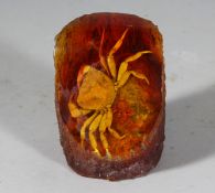 A PIECE OF AMBER with a crab. 4ins high.
