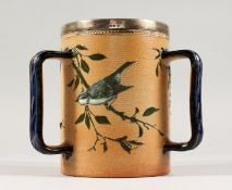 A GOOD DOULTON LAMBETH STONEWARE TYG by FLORENCE E. BARLOW decorated with birds. Maker F.E.B.