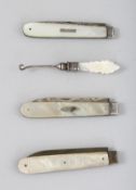 THREE SILVER AND MOTHER-OF-PEARL FRUIT KNIVES and a button hook.