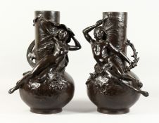 A SUPERB LARGE PAIR OF BRONZE BULBOUS VASES with two reclining nudes and male figures as handles.