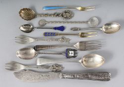 A BAG OF SILVER CUTLERY, butter knife, spoons and forks.