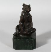 L. CARDIN A BRONZE BEAR on a marble plinth. 6.5ins overall.