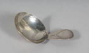 A GEORGE III CIRCULAR BOWL CADDY SPOON. London 1800.