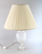 A CUT GLASS LAMP AND SHADE.