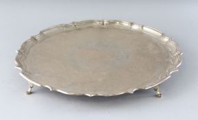 AN E.P.N.S. ENGRAVED PLATED SALVER. 14ins diameter.