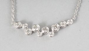AN 18CT WHITE GOLD AND DIAMOND (0.45cts) BUBBLE STYLE NECKLACE.